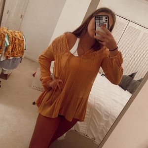 yellow long sleeve with lace back and front ties!!